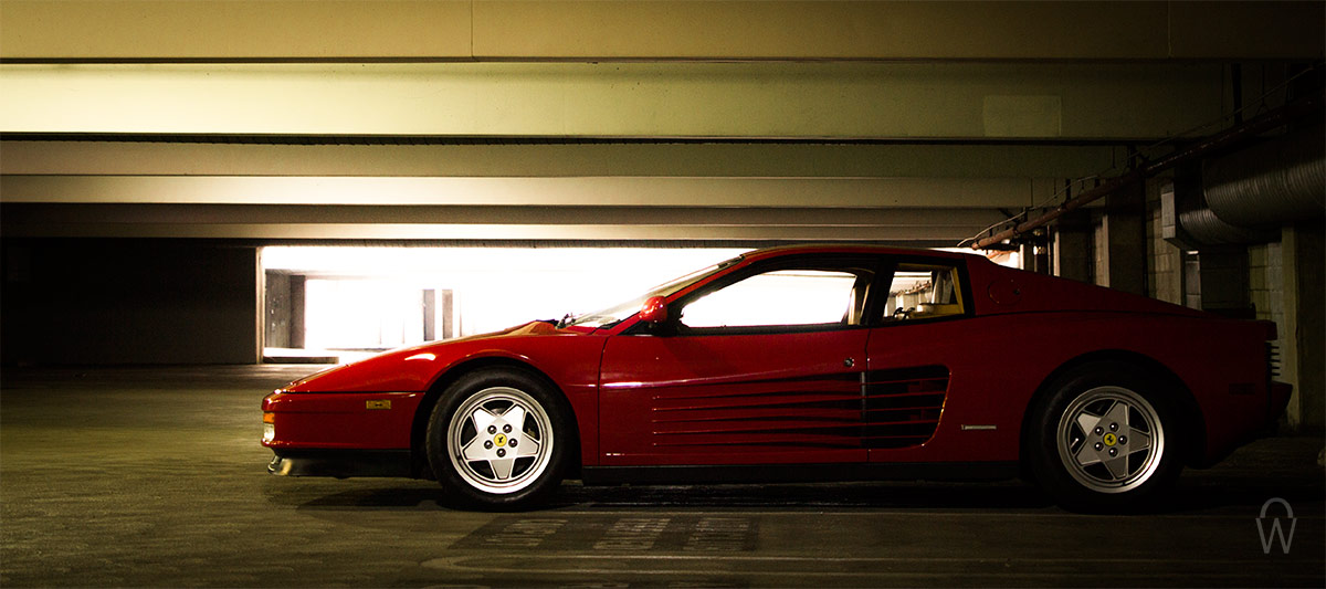 A red car inside a building.