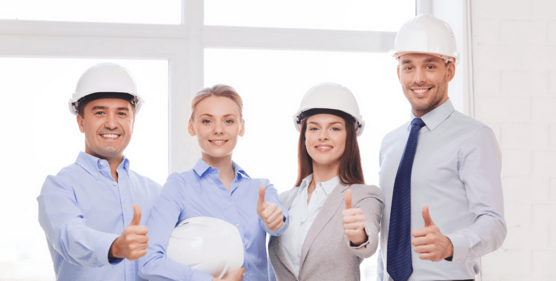 This team of four people give four thumbs up to workplace safety.