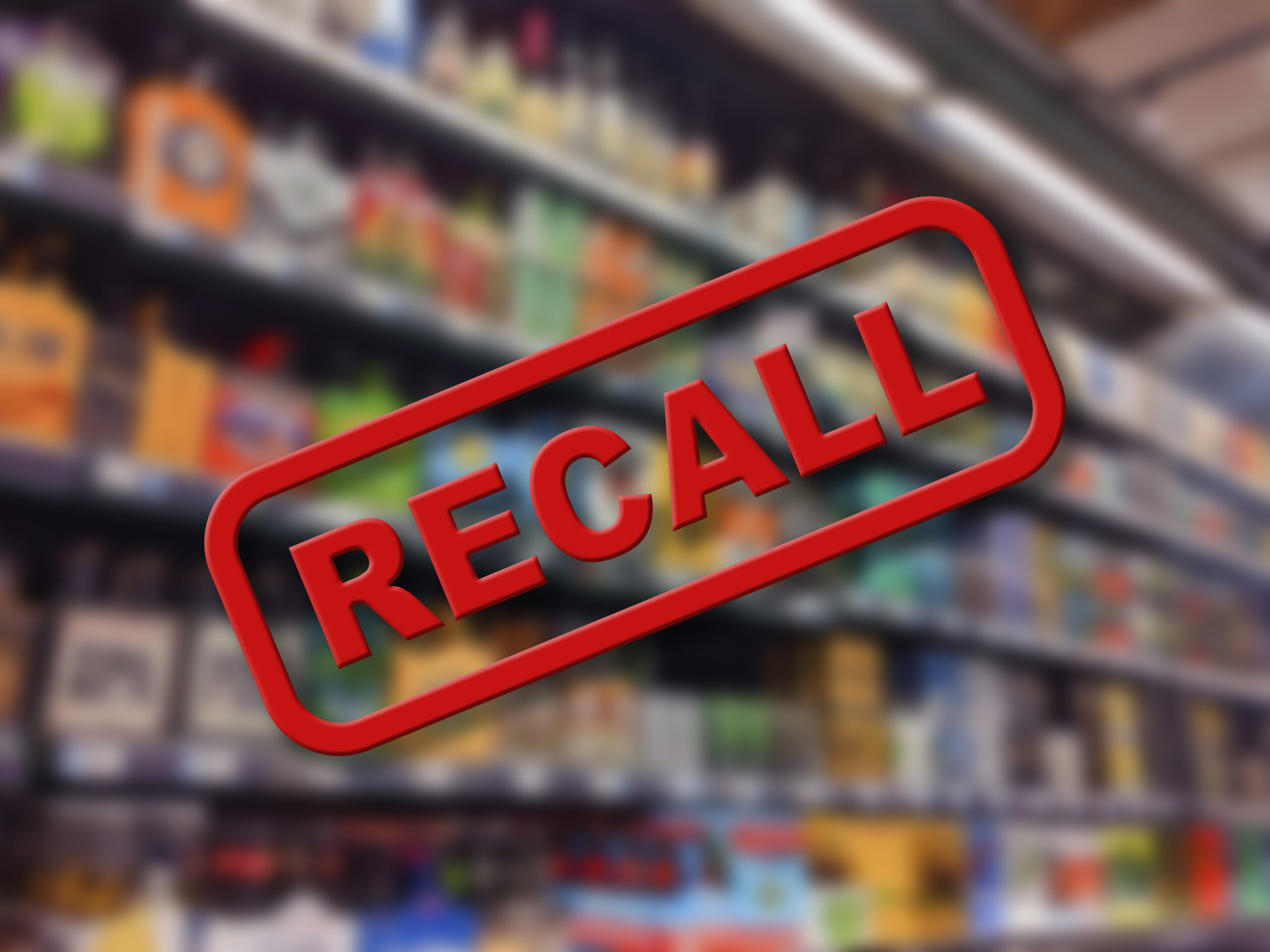 Grocery store shelves with the word "Recall" over them