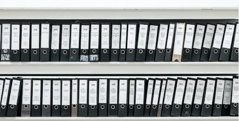 Shelves of binders