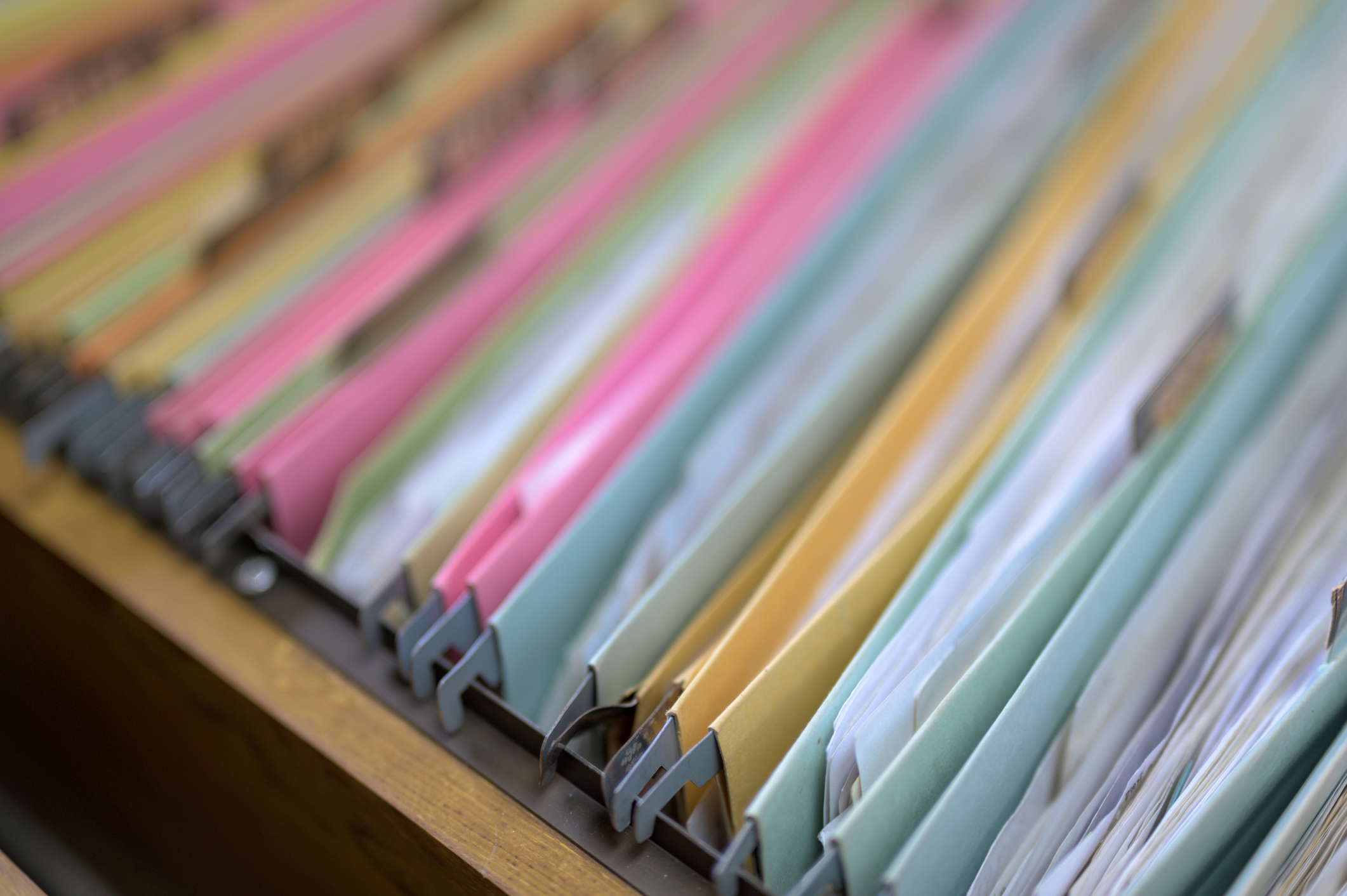 Filing cabinet with folders for record keeping