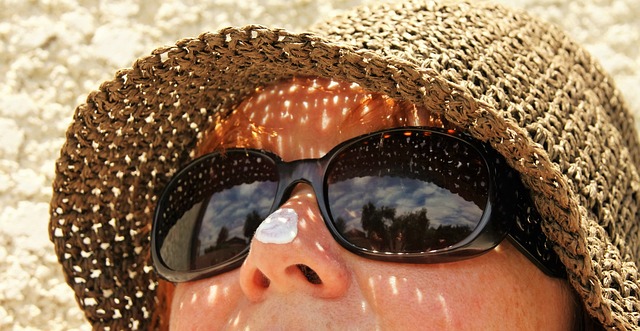 Woman with sunblock on her nose