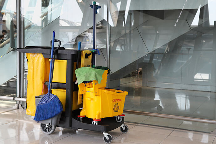 Closeup of janitorial, cleaning equipment and tools for floor cleaning.