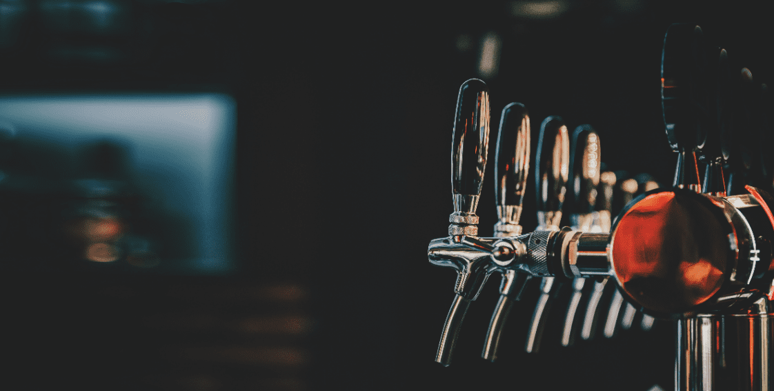 Kegs on tap at a brewery