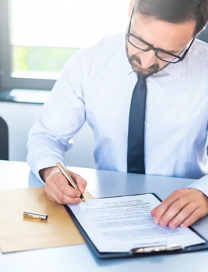 Business man signing documents