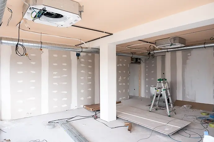Interior room renovation installing hvac and drywall construction